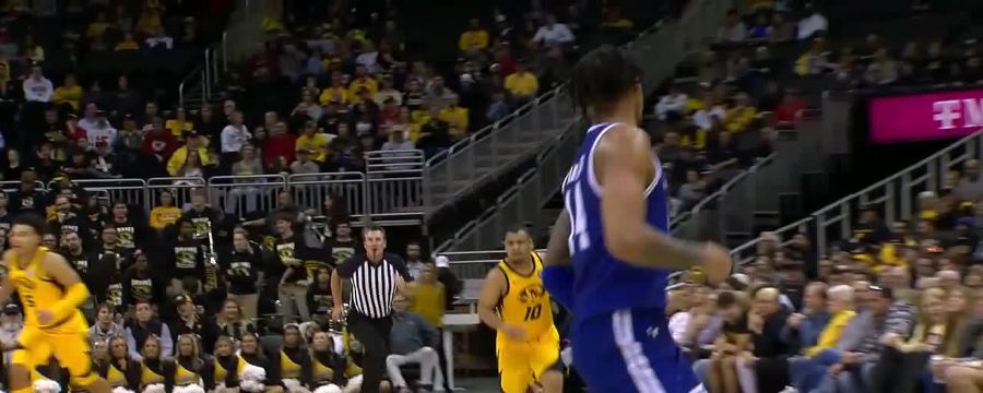 Dre Davis gets up for the beautiful jam