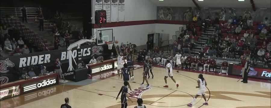 DJ Dudley drives in for a layup for Rider