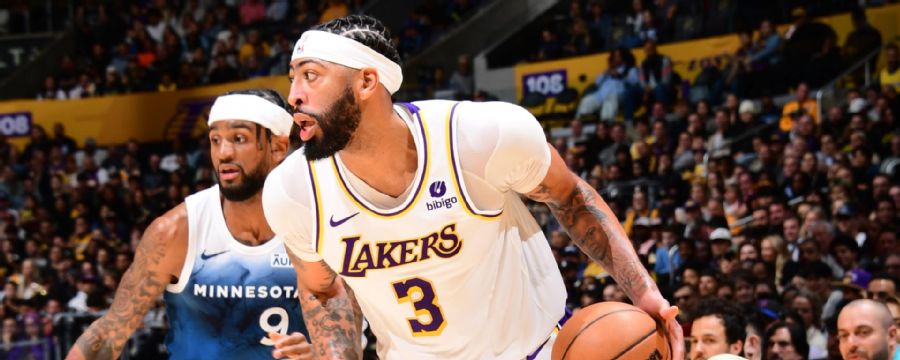 AD stuffs stat sheet with 27 points, 25 boards as Lakers top Wolves