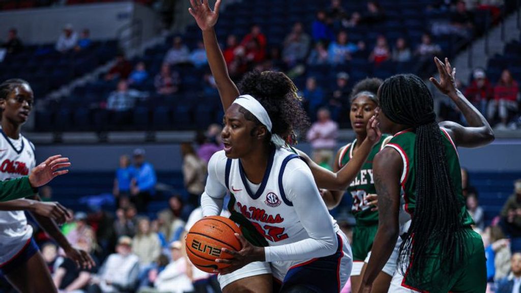 Balanced offense, tenacious defense lift Rebels to win