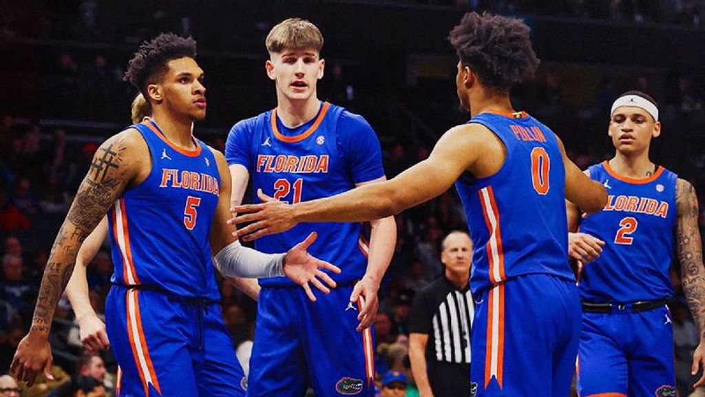 Florida holds off Michigan in double OT thriller