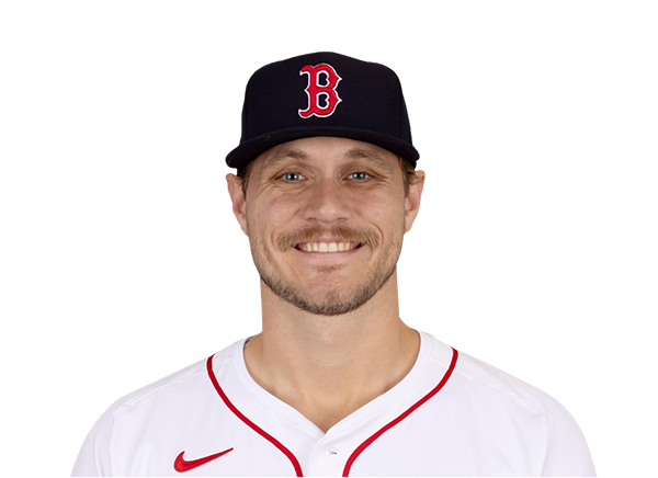 Boston Red Sox SP Tanner Houck holds a towel to his face after