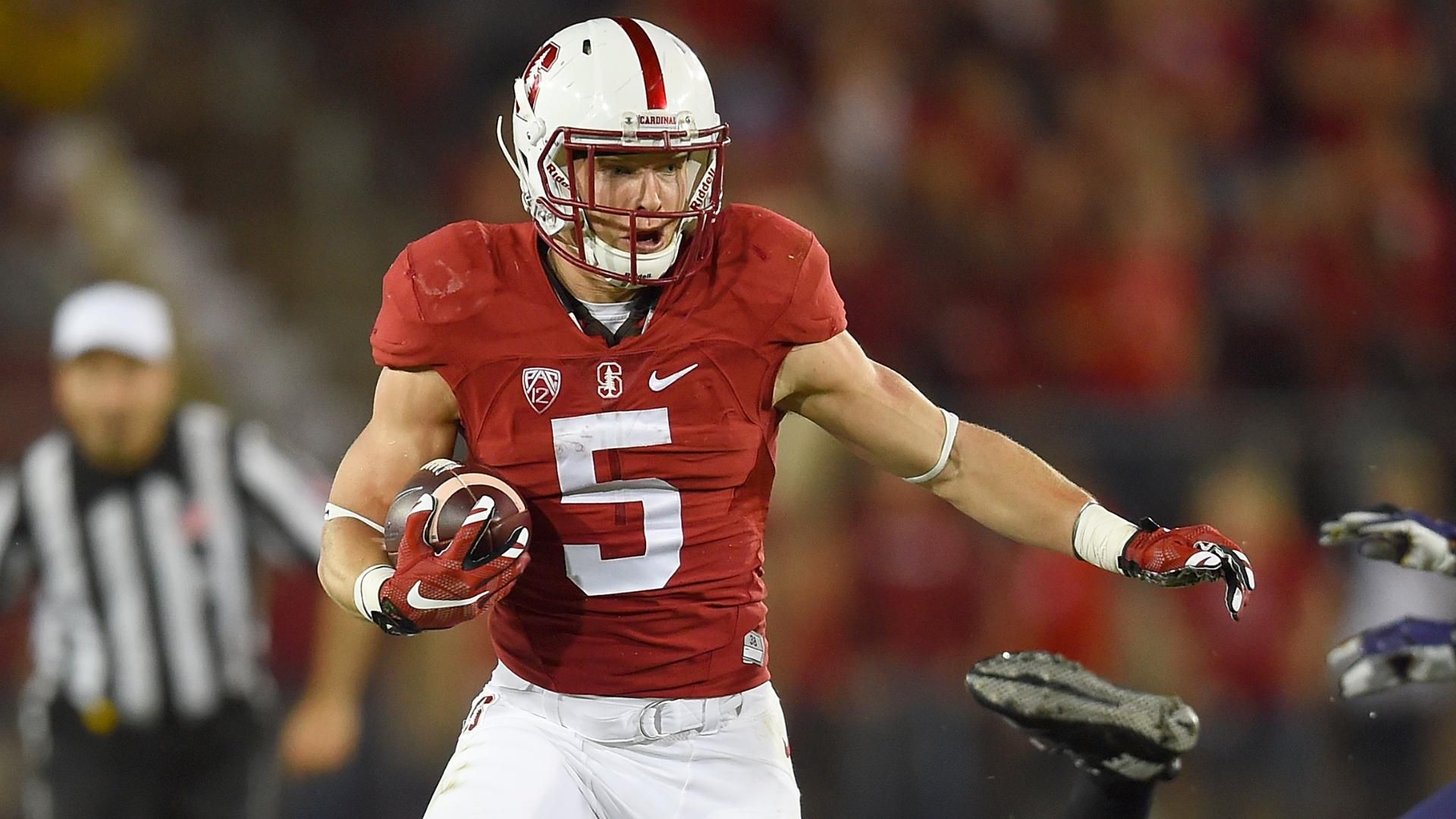 Christian McCaffrey Stanford Cardinal Unsigned Black Jersey Diving for  Catch vs. Washington State Photograph