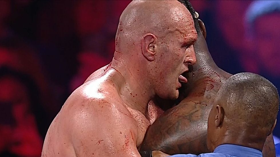 Fury appears to lick blood off Wilder - ESPN Video