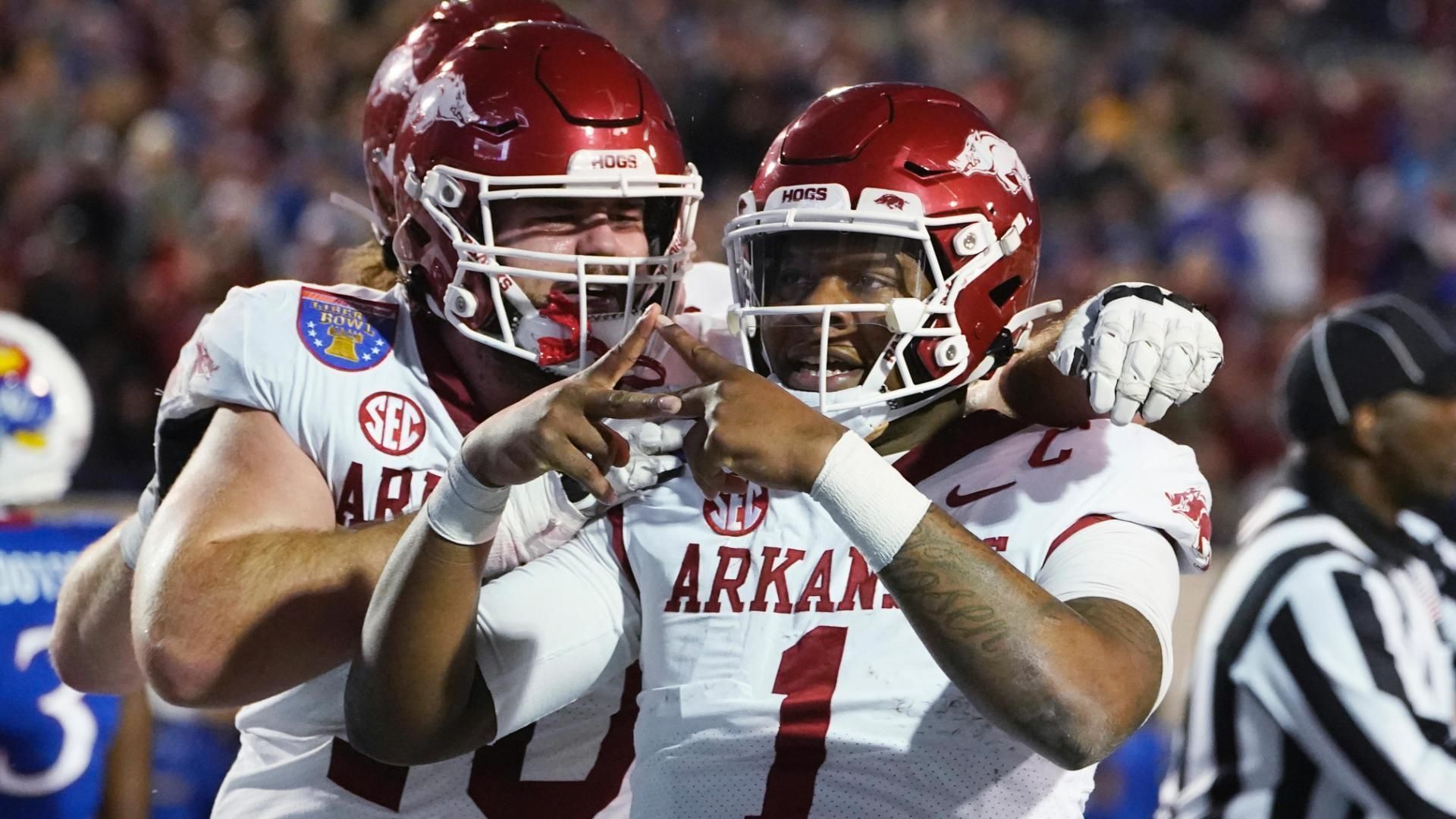 Razorbacks stop Jayhawks' 2-point attempt in 3OT to win thriller - ESPN ...