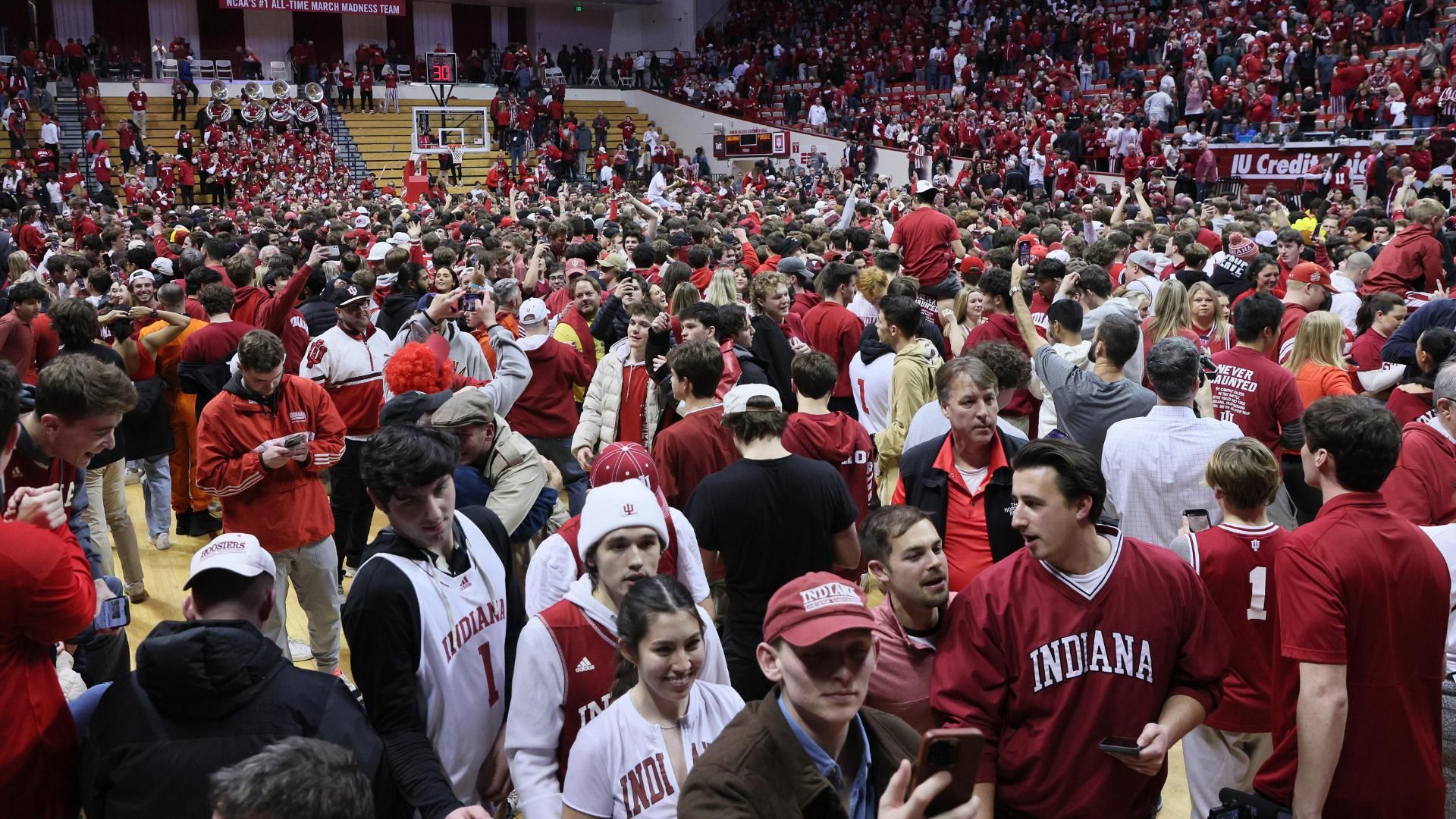 Indiana fans storm the court after defeating no 1 purdue espn video