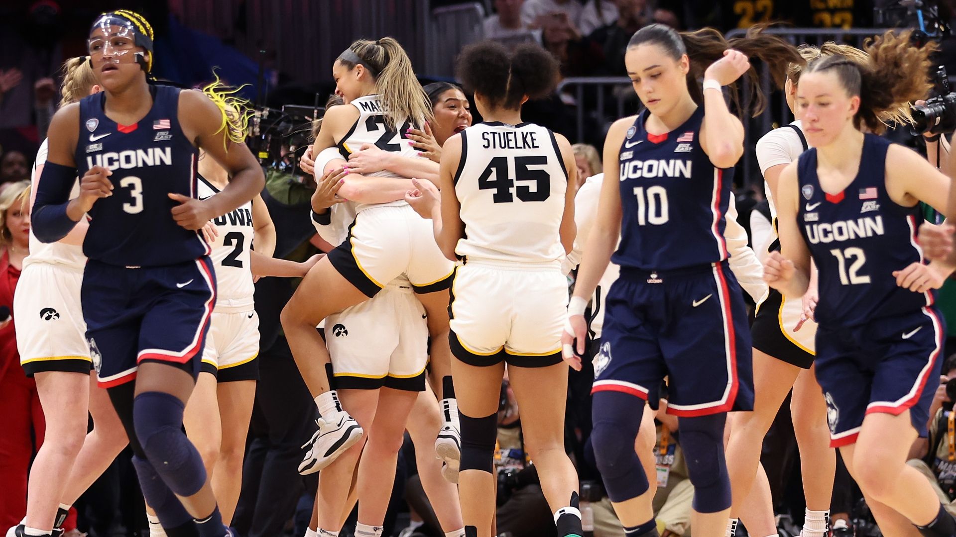 Iowa outlasts UConn, advances to NCAA women