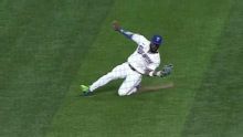Adolis Garcia makes dazzling sliding catch in right field
