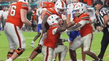 No. 4 Miami's defense holds Florida to 141 yards, Hurricanes ease past Gators 26-7 to move to 4-0