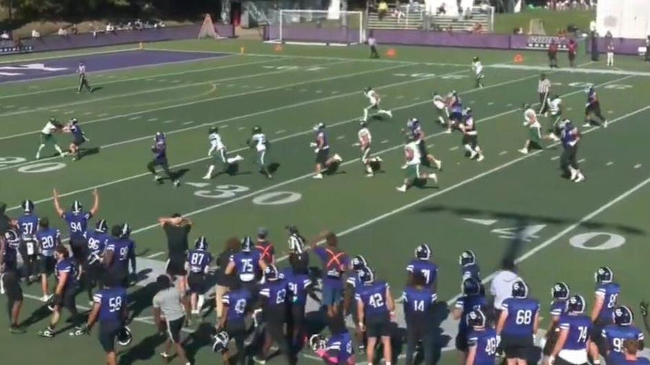 Montie Quinn running with the ball