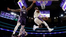 Luka Doncic and LeBron James combine for 68 points, Lakers end skid with 125-101 win over Kings