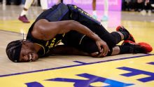 Warriors star Jimmy Butler goes down with right knee injury in win over Heat
