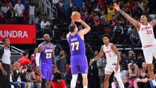 Doncic drops 40, James adds 30 as Lakers stretch their streak to 7 with 124-116 win over Rockets
