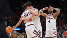 Illinois powers its way to its first Final Four in 21 years, beating Iowa 71-59