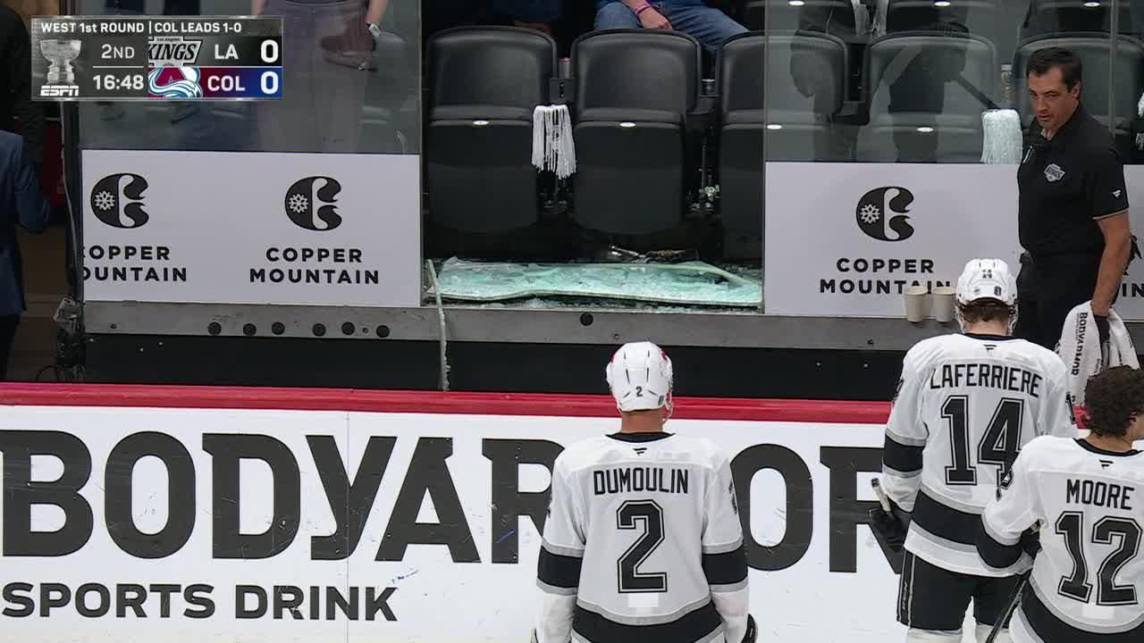 Glass shatters behind Kings bench, delays game