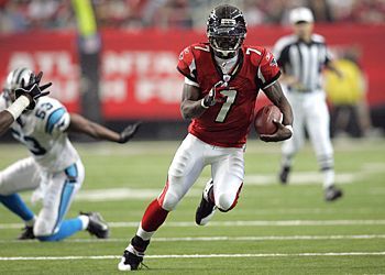 Lewis Runs Over Falcons, and Defense Runs Down Vick - The New York