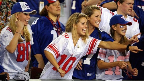 Fans queue up outside the NFL Shop before an NFL football game