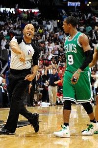 Boston Celtics' Paul Pierce signals to the referee that he thought