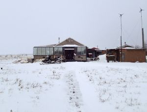 View of outside of cabin in Unalakleet