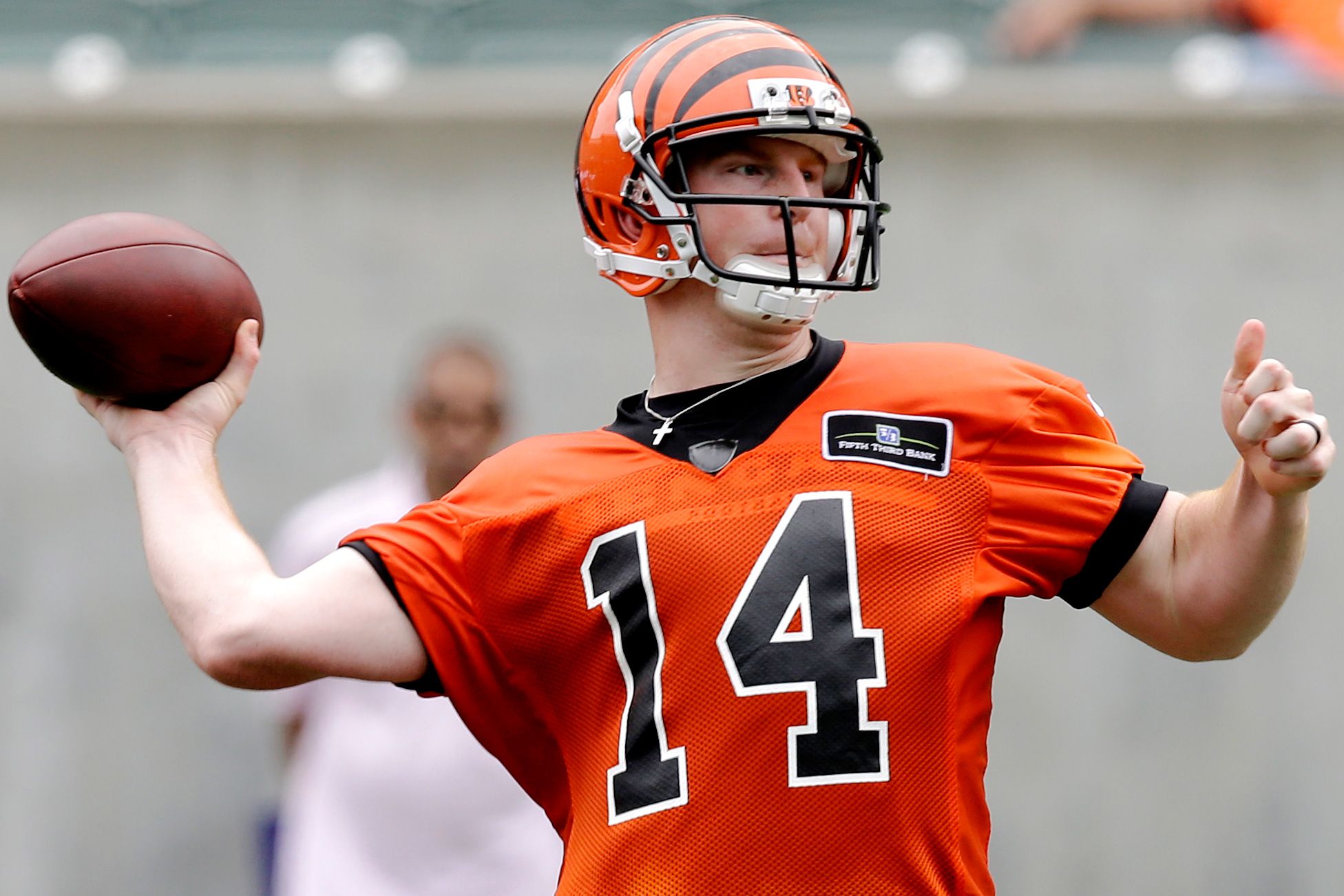 Cincinnati Bengals - Cincinnati Bengals second round draft pick Andy Dalton  poses with his jersey during an NFL football news conference, Saturday,  April 30, 2011, in Cincinnati. (AP Photo/David Kohl) AP2011