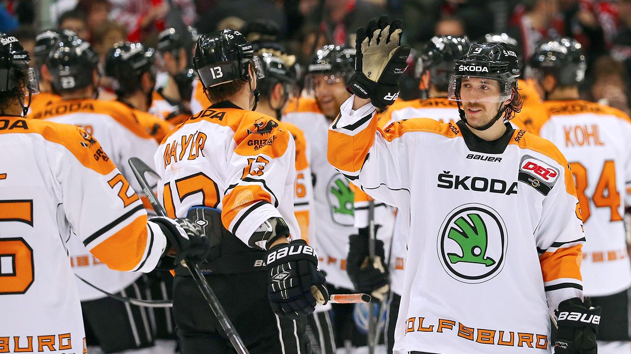 hockey-team-plays-football-on-ice-espn