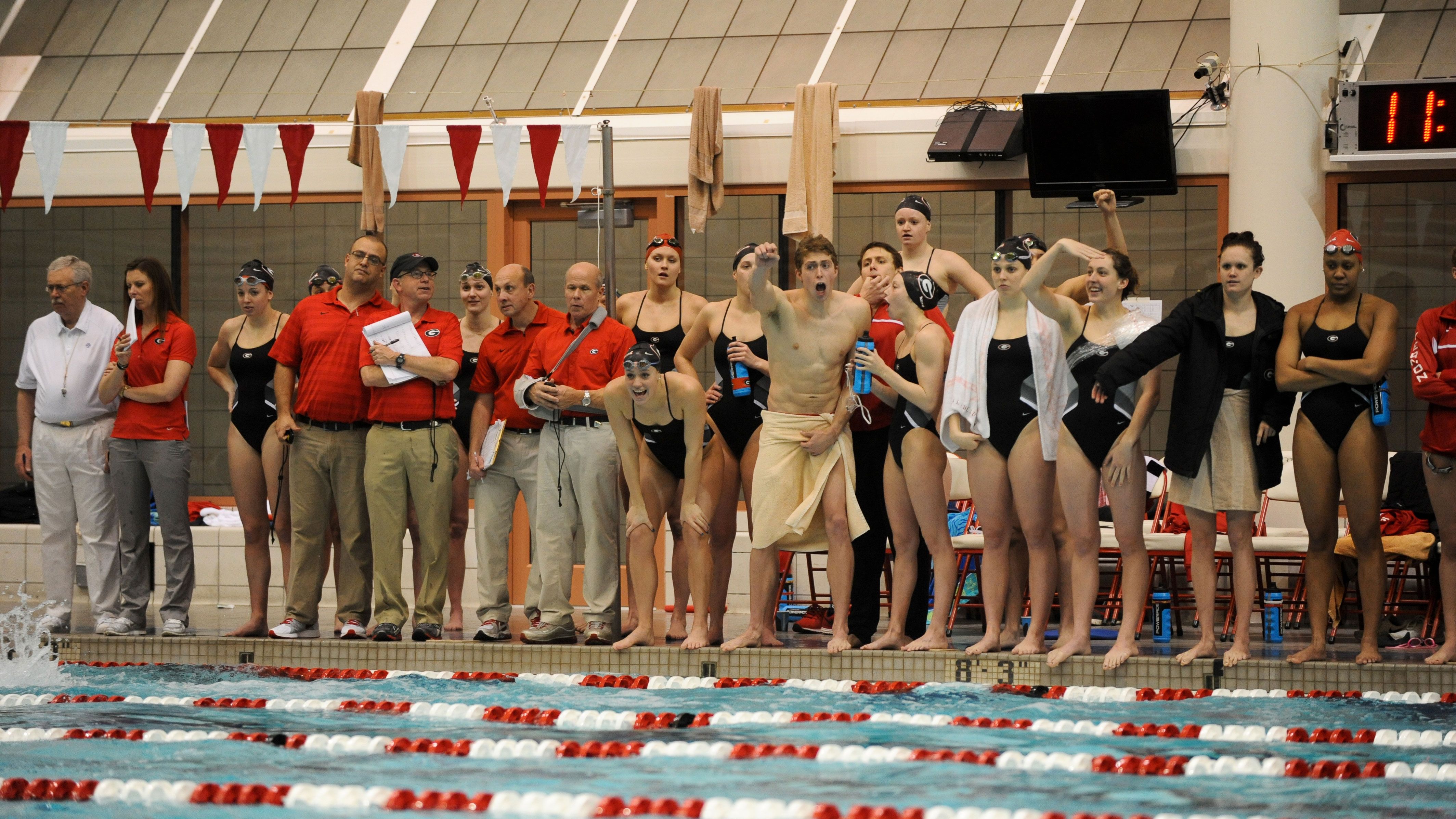 swimming and diving teams win at Tennessee