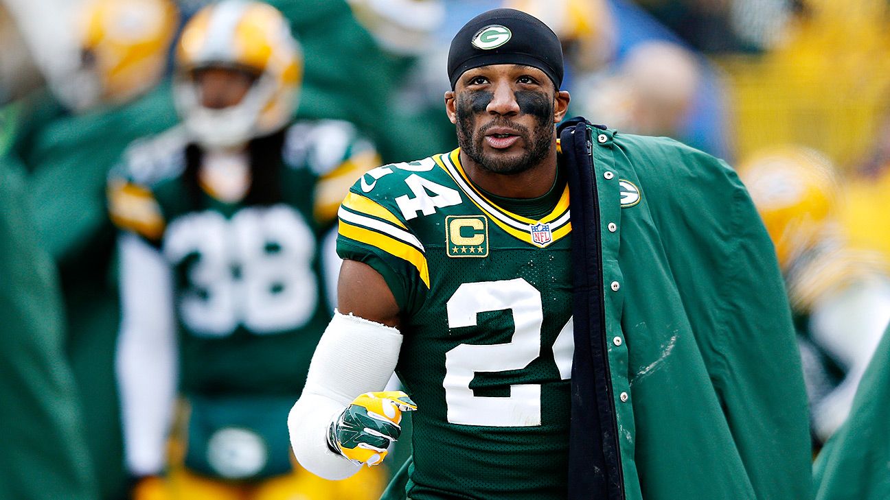 Green Bay Packers cornerback Jarrett Bush (24) holds the ball