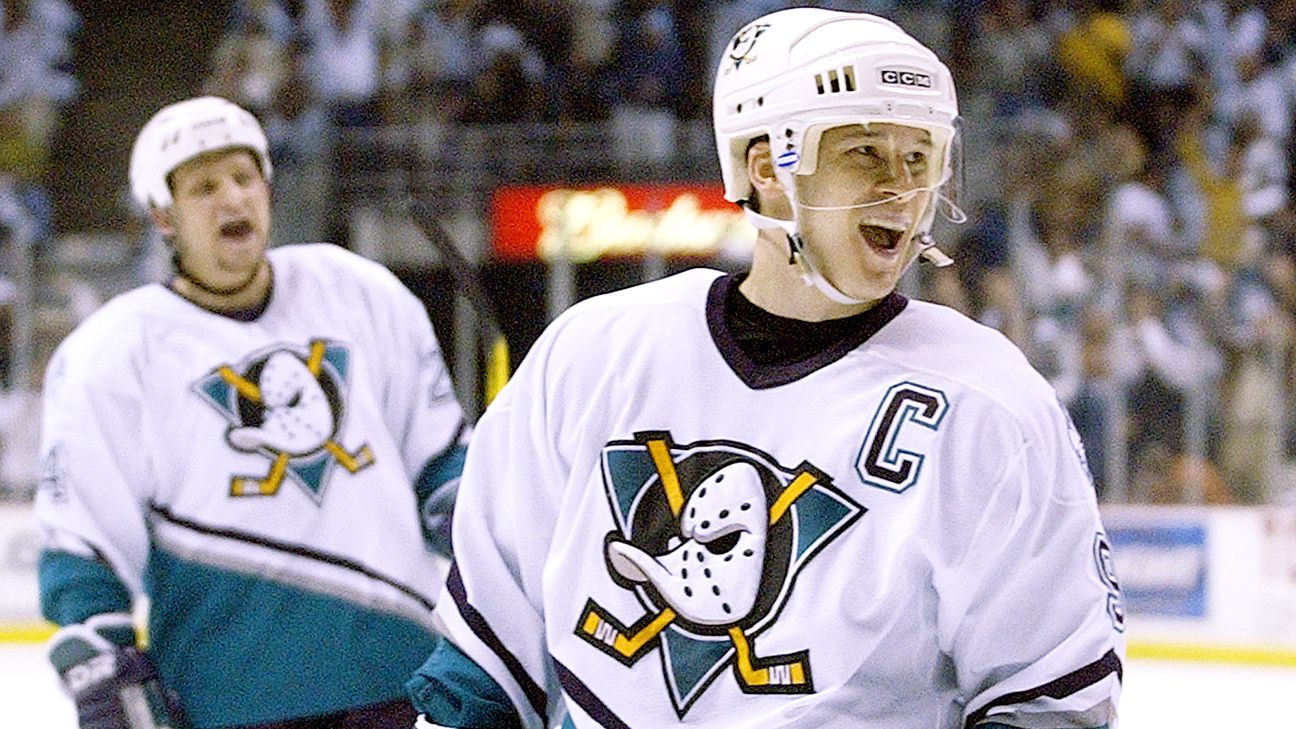NHL99: Paul Kariya, dog on his chest, feet in water, is content away from  hockey - The Athletic