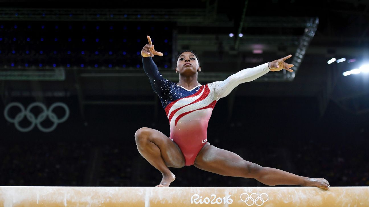 With team golds around necks, U.S. women's gymnasts turn attention to