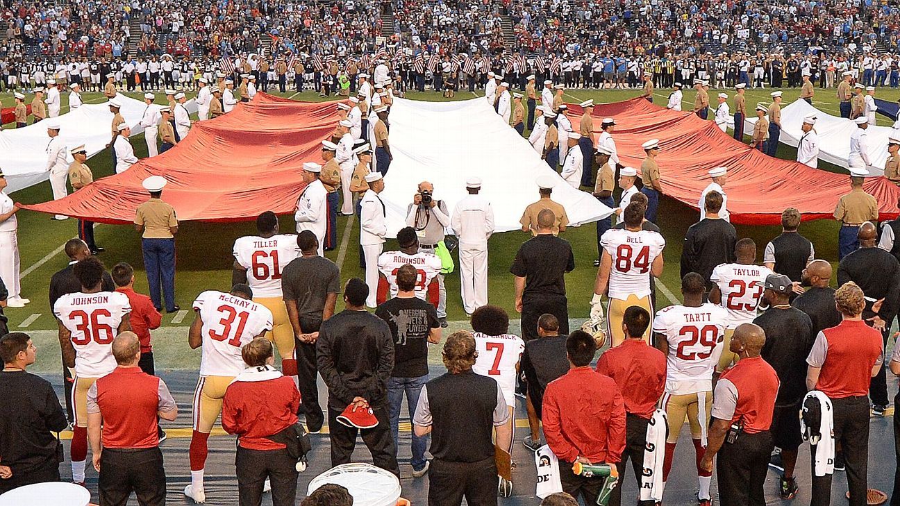 Colin Kaepernick of San Francisco 49ers sits during national anthem prior  to preseason game - ESPN