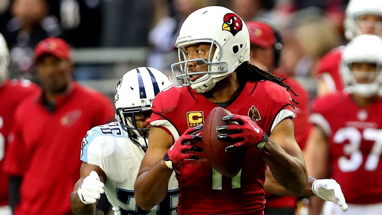 Arizona Cardinals' Larry Fitzgerald aided by Hines Ward