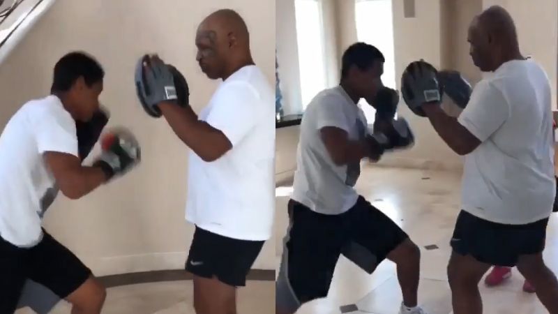 Mike Tyson takes his 15-year-old son on the pads