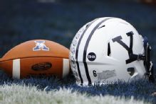 Reno throws for 4 TDs, leads Yale to win after death of father