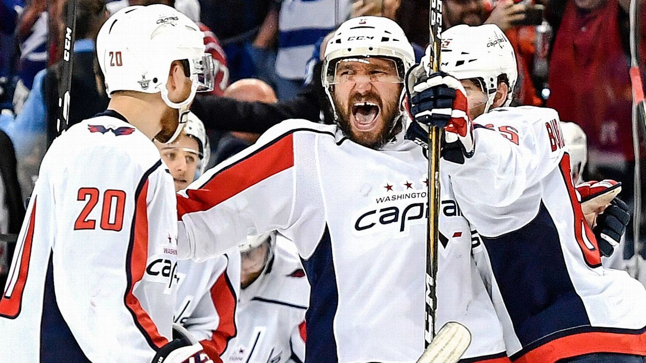 New York Rangers Derek Stepan celebrates with teammates after scoring the  game winning goal in overtime against the Washington Capitals in game 7 in  the second round of the Stanley Cup Playoffs