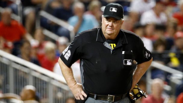 MLB umpire suspended for grabbing player