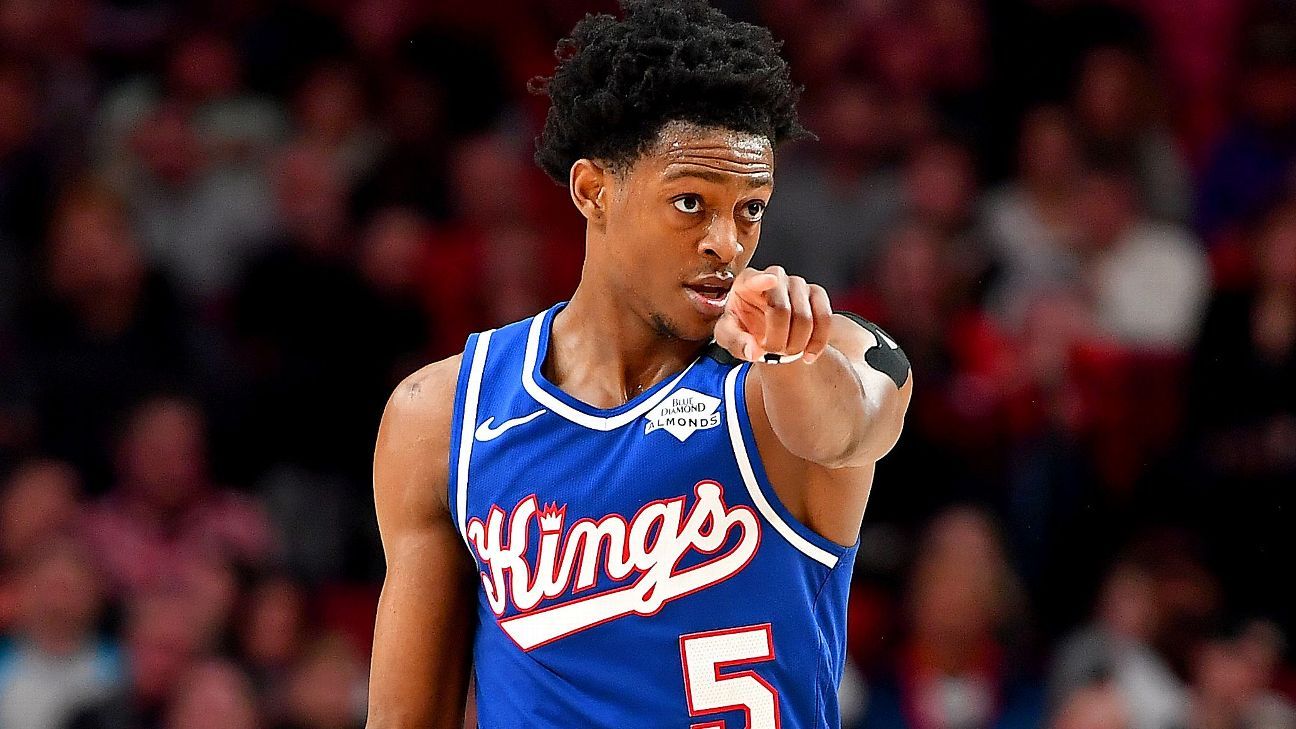 Sacramento Kings guard De'Aaron Fox (5) dribbles the ball during the second  half of an NBA basketball game against the Washington Wizards, Wednesday,  March 17, 2021, in Washington. The Kings won 121-119. (