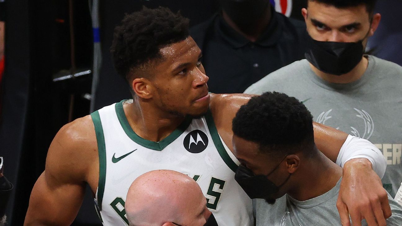 WATCH: Marcus Smart, Trae Young get in heated exchange, wrestle each other  to the floor - On3