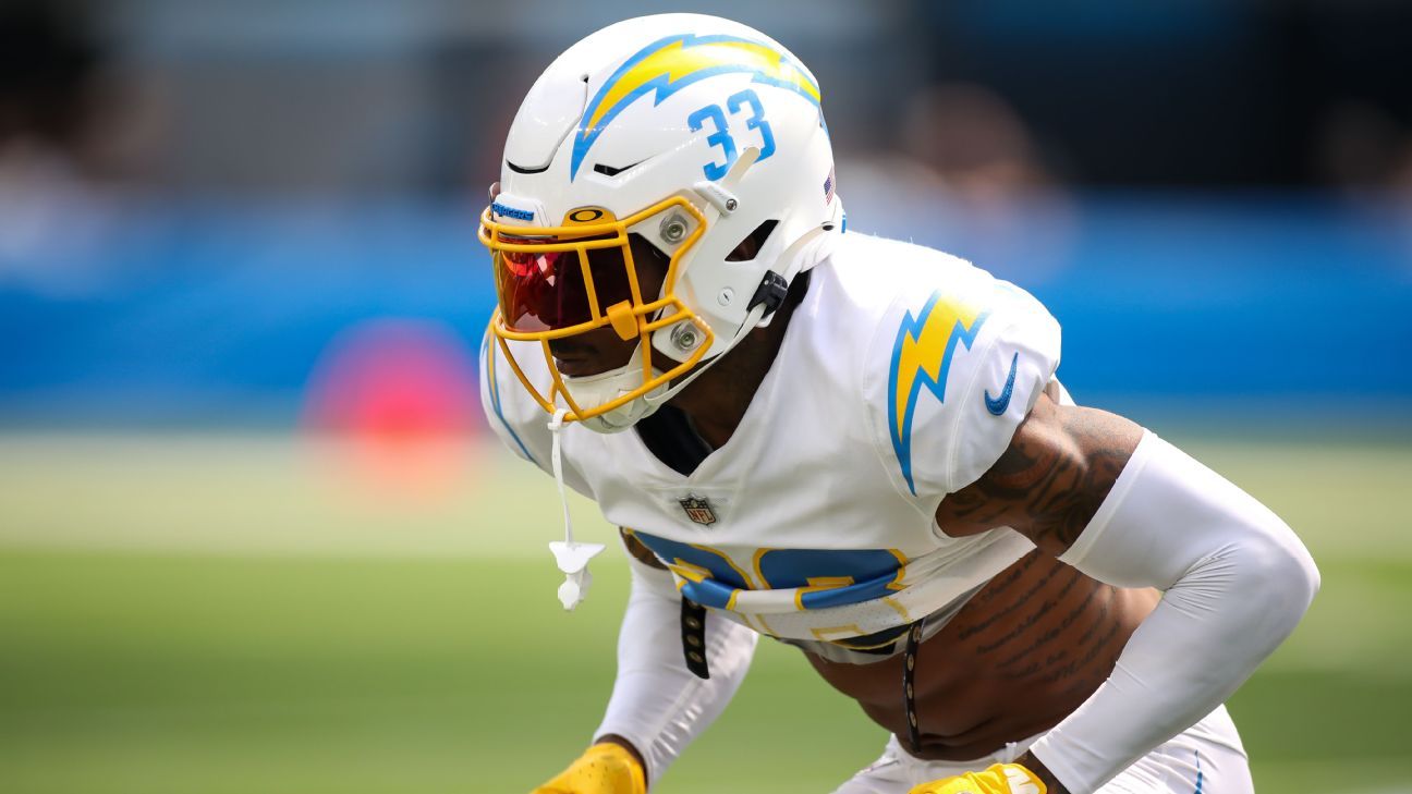 Derwin James Jr. #3 of the Los Angeles Chargers forces a fumble