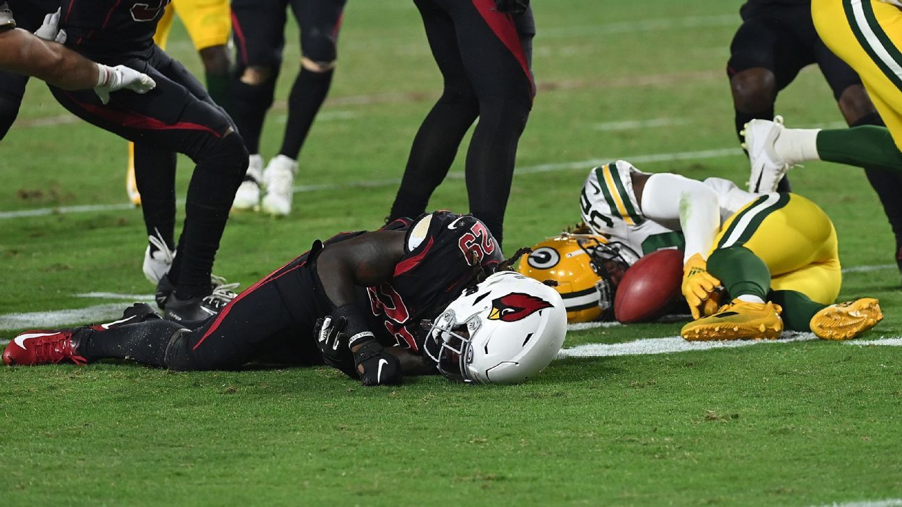 Arizona Cardinals running back Jonathan Ward (29) makes a catch in front of  Cardinals safety Deionte Thompson (22) during NFL football training camp  practice, Monday, Aug. 2, 2021, in Glendale, Ariz. (AP