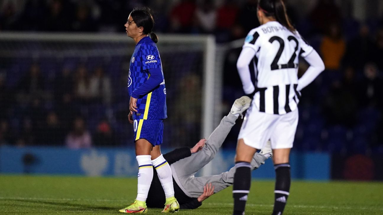 Kerr-blam! Chelsea star flattens Champions League pitch invader