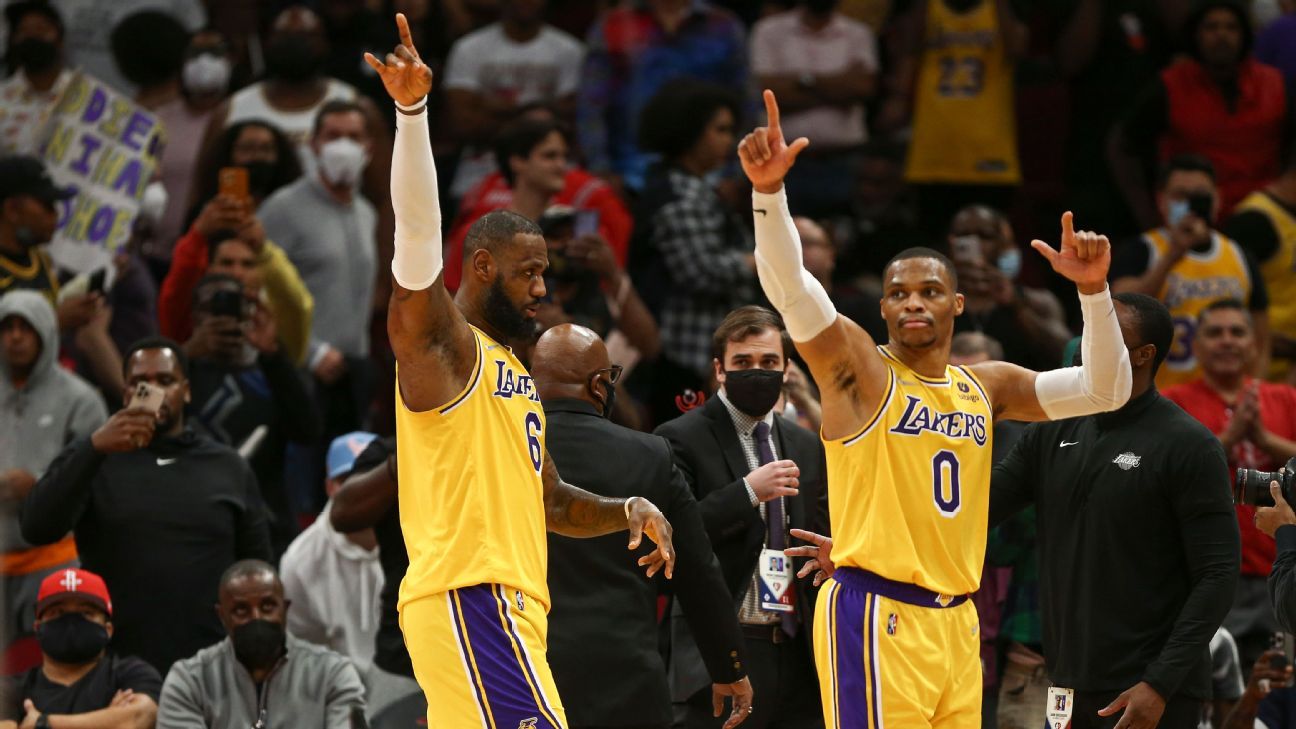 LeBron James makes first start at center as Los Angeles Lakers beat Houston Rock..
