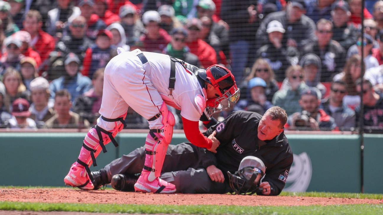 Plate umpire Ron Kulpa hit in mask by foul ball, leaves game