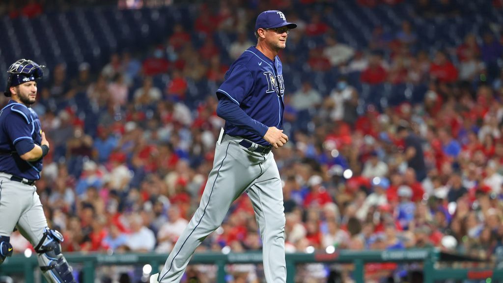 Tampa Bay Rays pitching coach Kyle Snyder, left, looks on as Shane