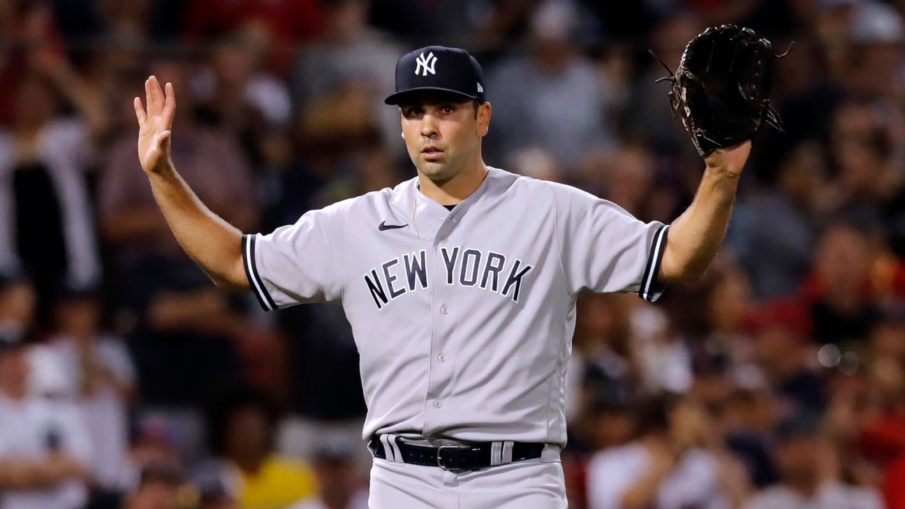 New York Yankees reliever Lou Trivino scrambles to change after