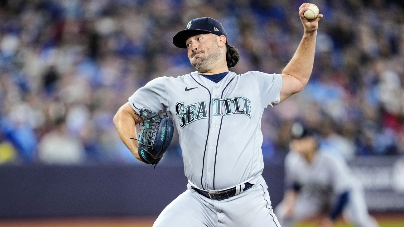 Seattle Mariners starting pitcher Robbie Ray begins his windup