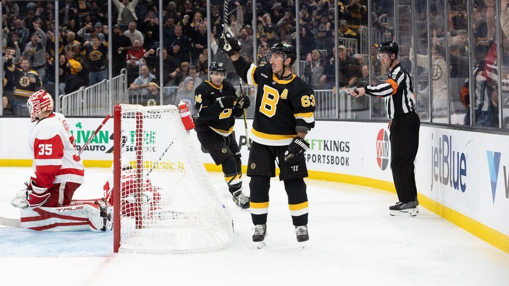 Marchand scores 2 goals for Bruins in return