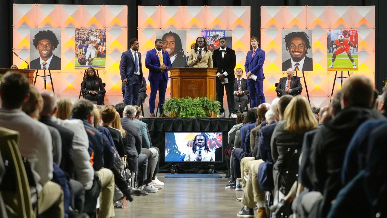 Virginia football players honored in memorial service