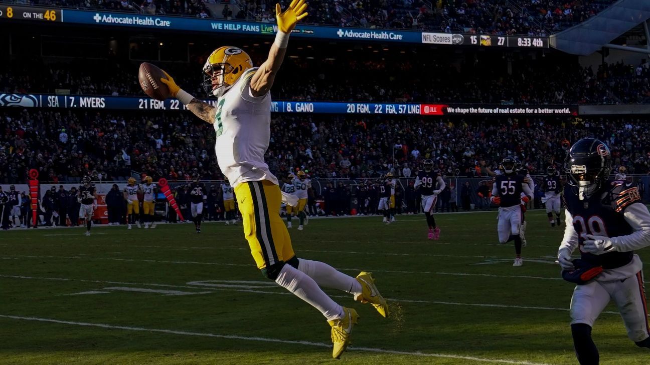 Christian Watson Green Bay Packers Unsigned Leaping for a