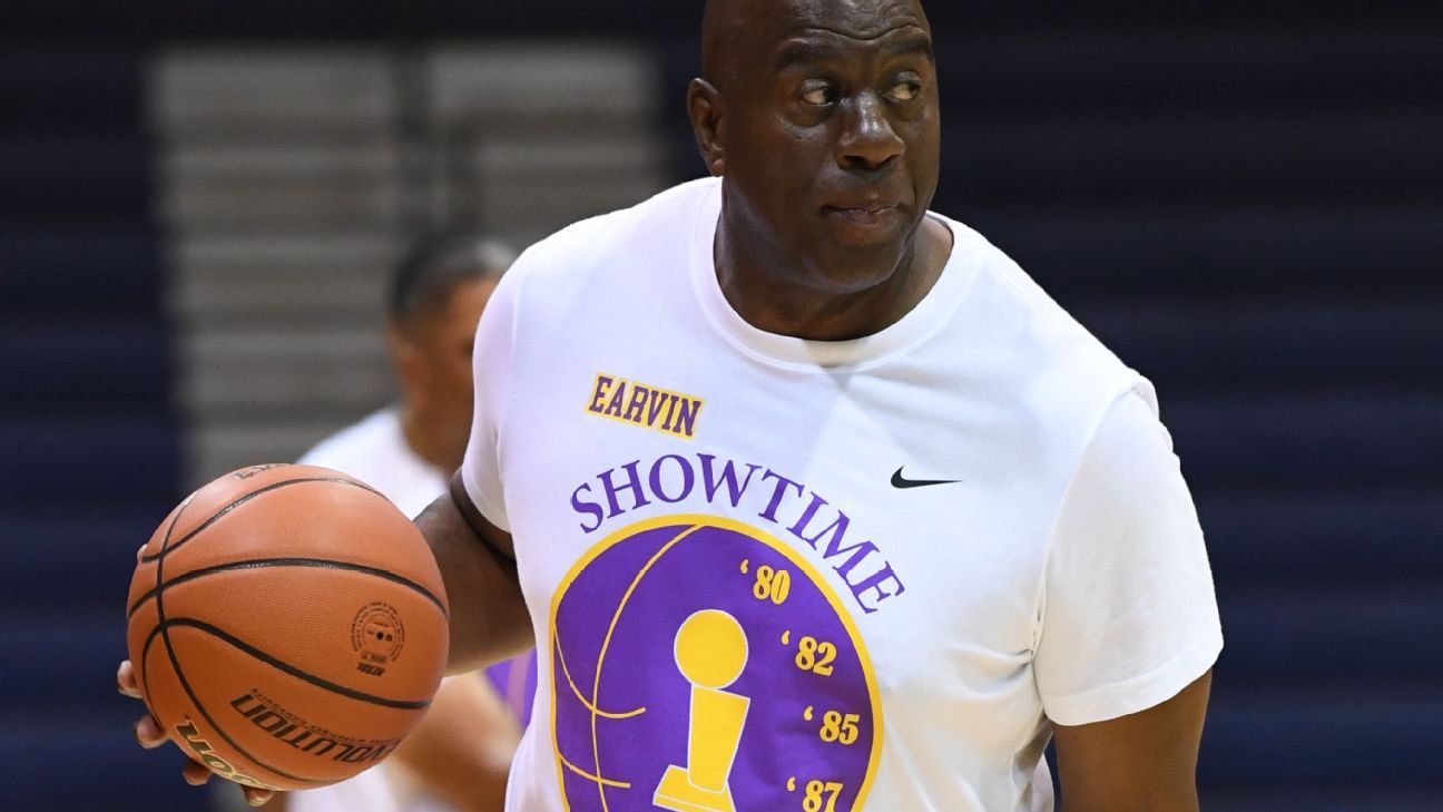 Sources: Magic Johnson joins group bidding to buy Commanders - ESPN