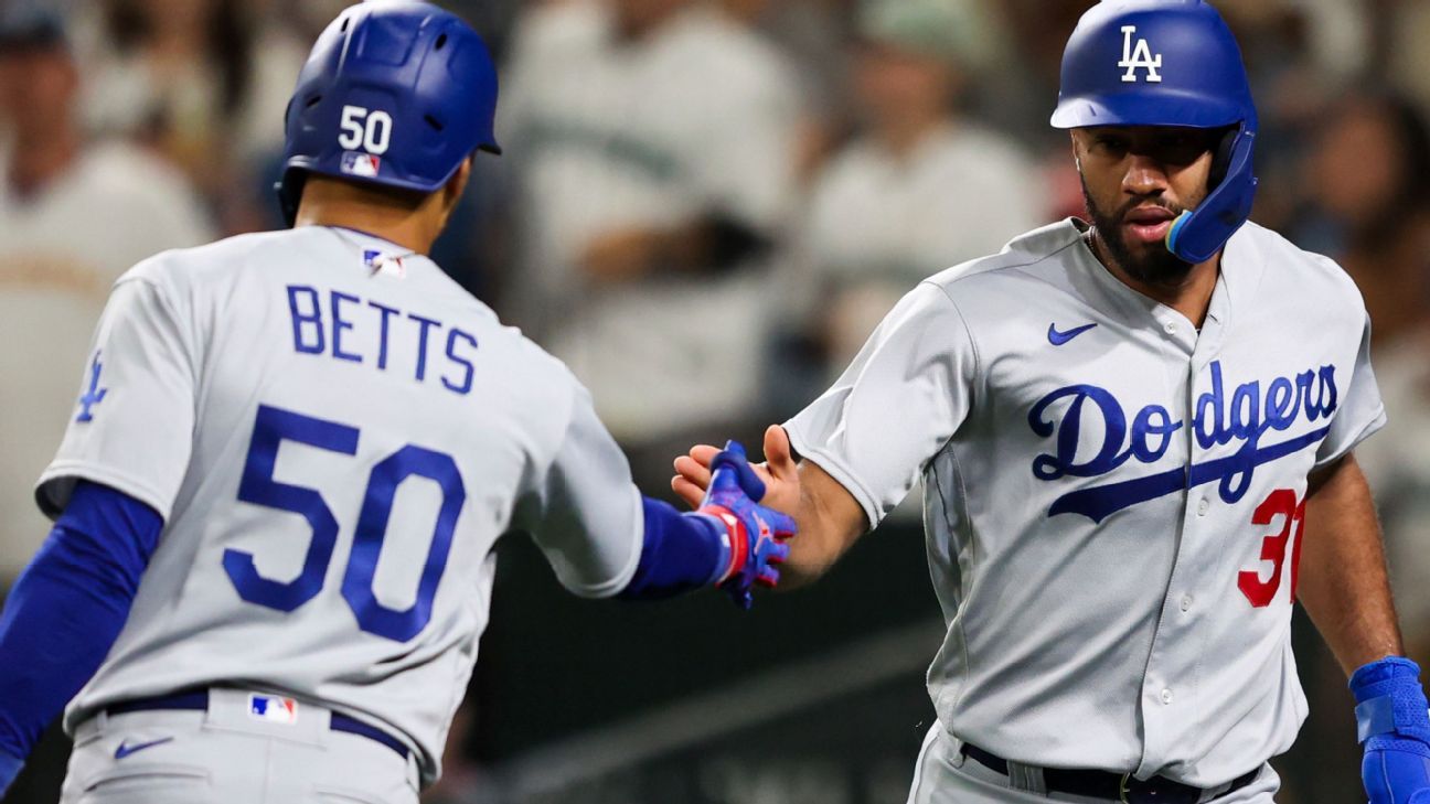 Dodgers wrap up NL West title for 10th time in 11 years with 6-2 win over  Mariners in 11 innings